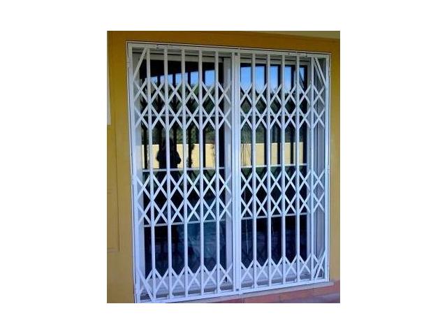 PUERTAS DE BALLESTA PARA COMERCIO Y VIVIENDA